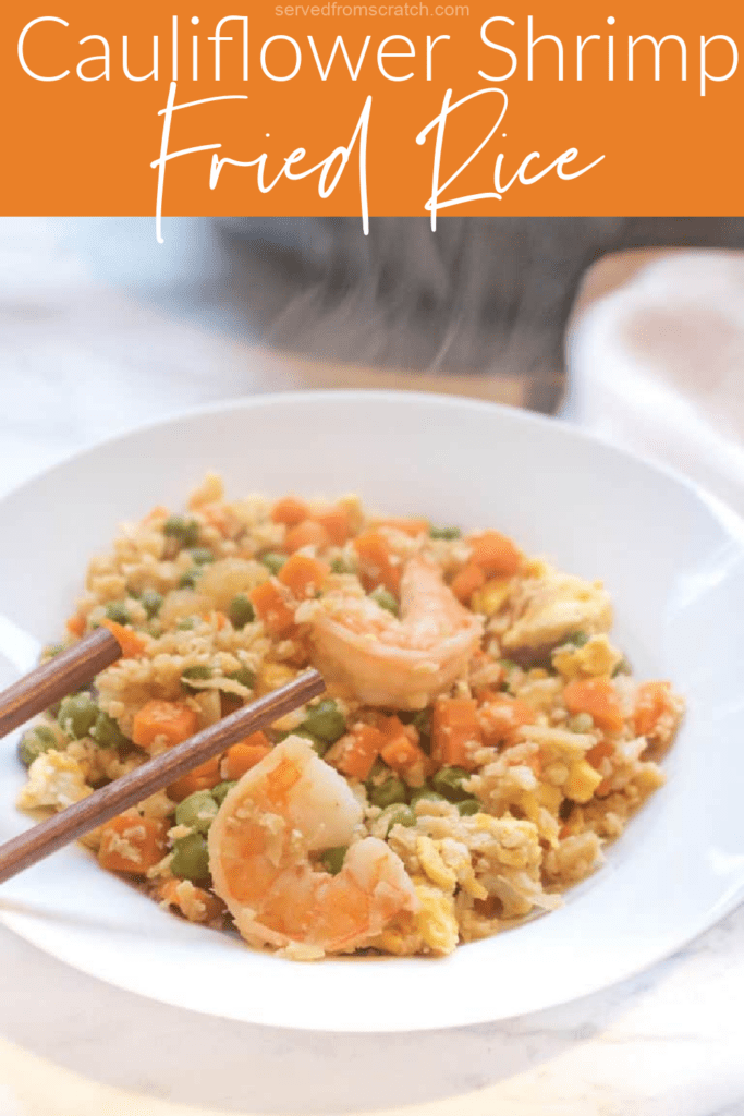 a bowl with chopsticks and shrimp and cauliflower rice with Pinterest pin text.