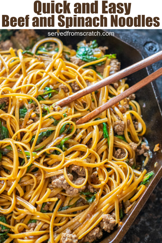 noodles in a cast iron with chopsticks spinach and beef and Pinterest text.