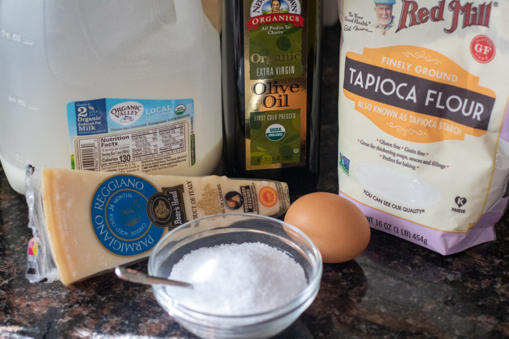 This Easy Brazilian Cheese Bread is a yeast free, gluten free bread that uses tapioca flour and only has a couple of other staple ingredients. #braziliancheesebread #recipe #glutenfree #yeastfreebread #bread #cheese 