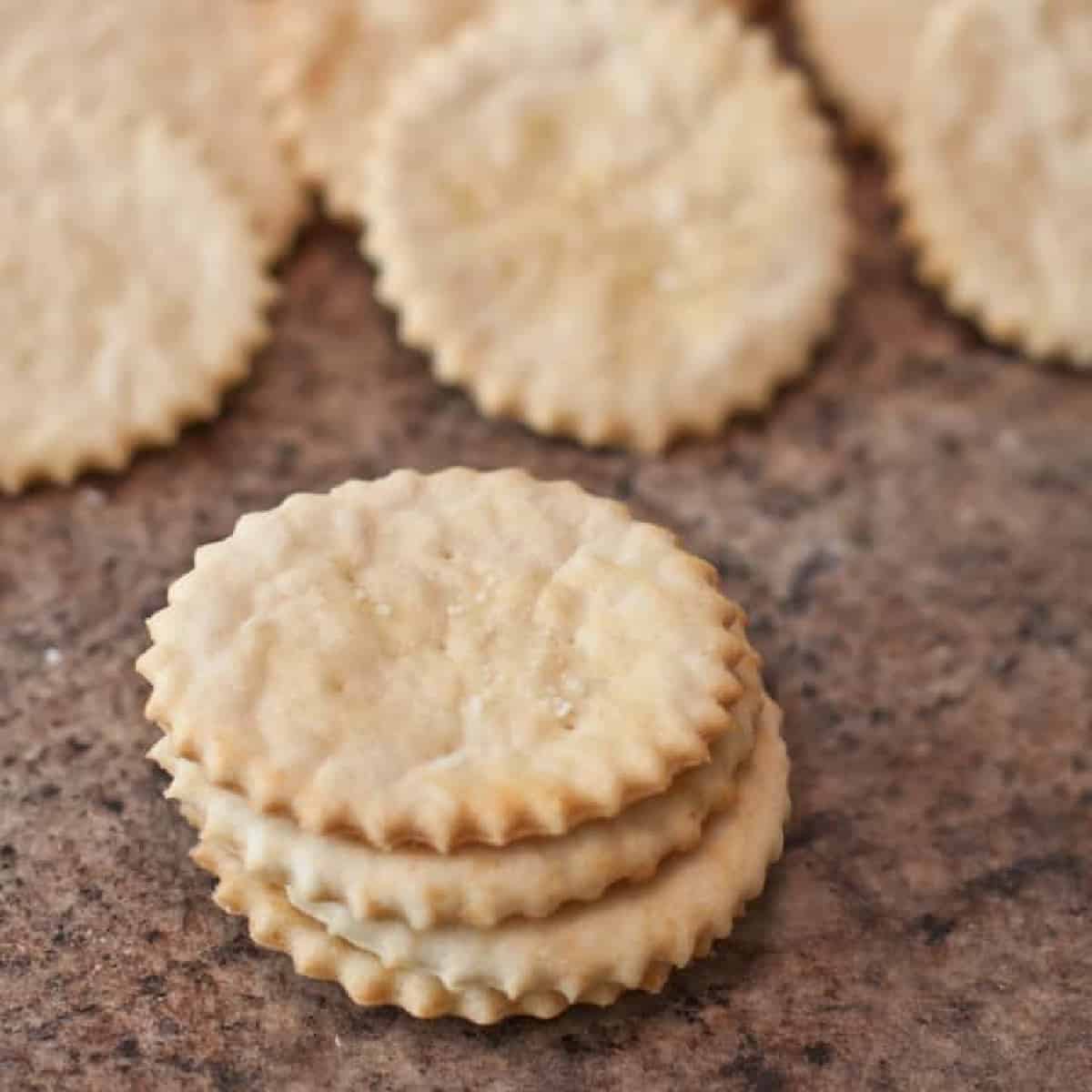baked ritz crazkers staacked and lined up