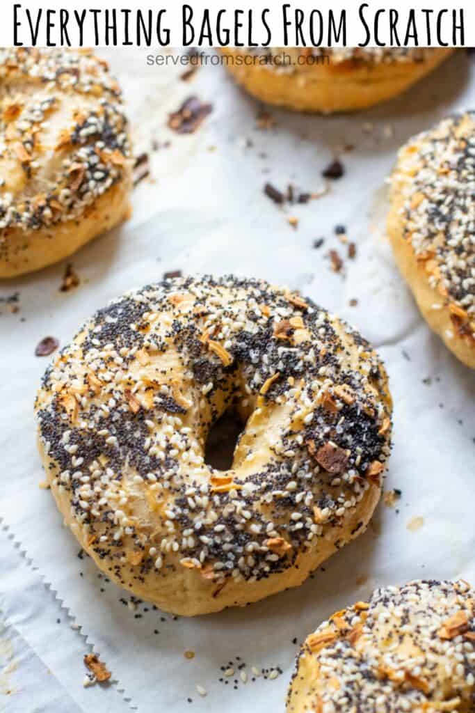 baked everything bagels from scratch on a baking sheet with Pinterest pin text.