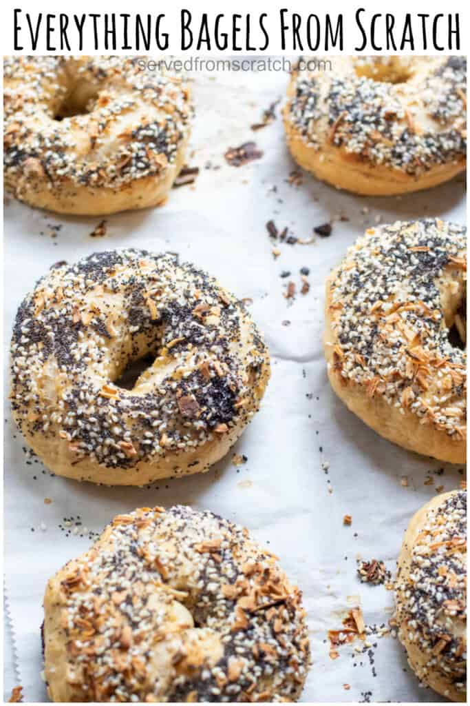 baked everything bagels from scratch on a baking sheet with Pinterest pin text.