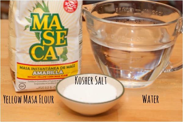 masa flour, kosher salt, and water on the counter