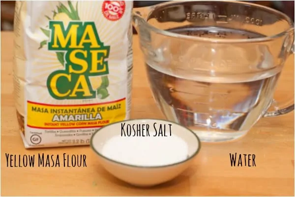 masa flour, kosher salt, and water on the counter