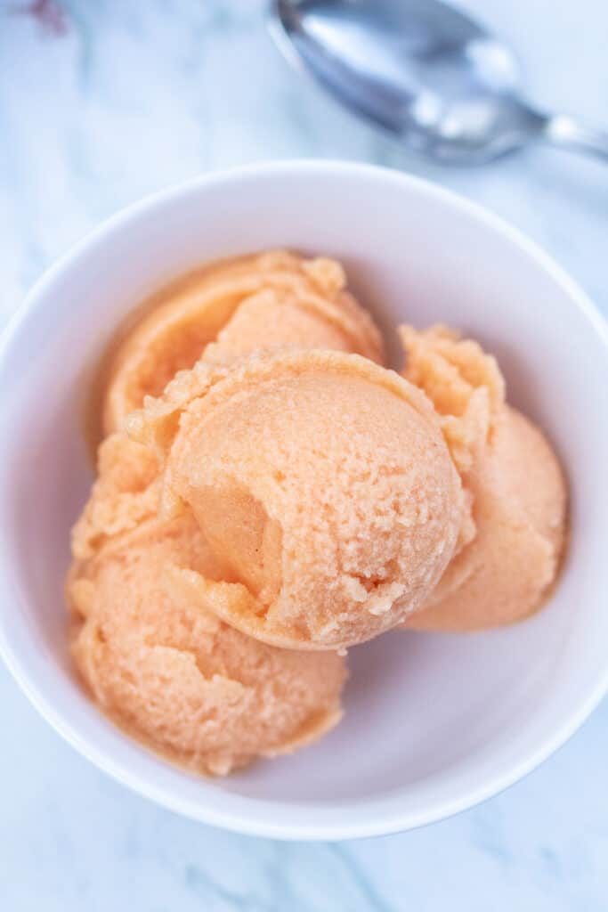 peach sorbet in a bowl 