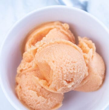 a bowl of peach sorbet.