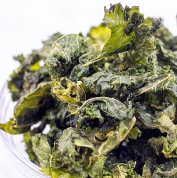 a bowl of crispy kale chips.