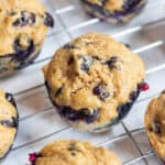 blueberry muffins on a cooling rack.