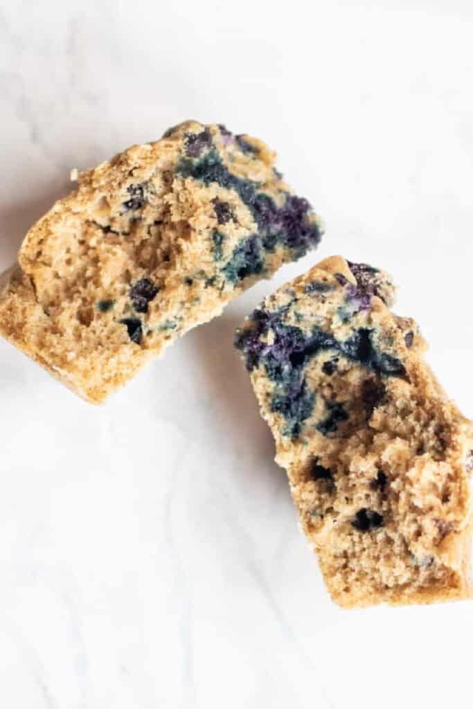 a blueberry muffin halved.