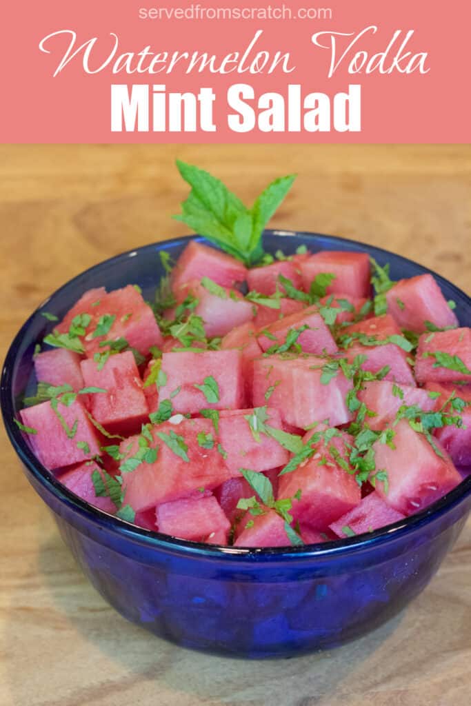 a blue bowl of cubed vodka with mint with Pinterest pin text.