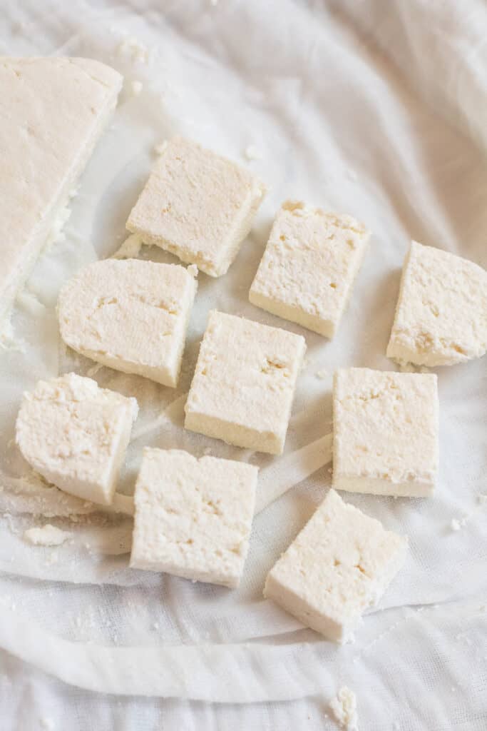 cubed paneer in a cheese cloth