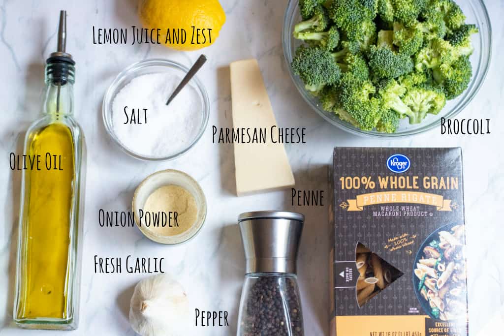 ingredients for broccoli penne on a counter