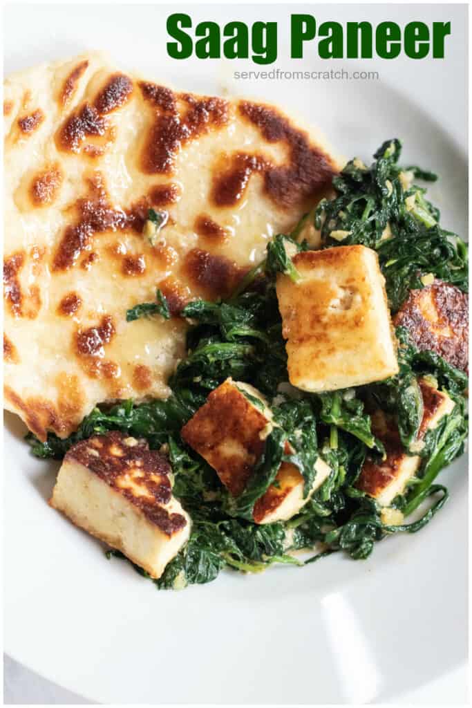 a plate with naan and paneer and spinach with Pinterest pin text.