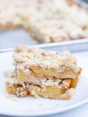 2 stacked baked zucchini bars.