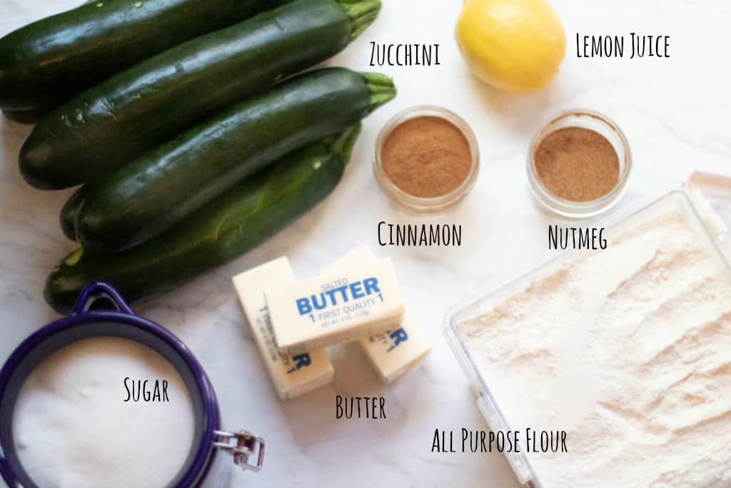 zucchinis, butter, sugar, cinnamon, flour, nutmeg, and lemon.