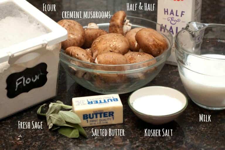 flour, mushrooms, butter, sage, salt, milk, and half and half on a counter.