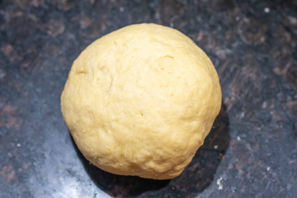 a smooth ball of dough on a counter