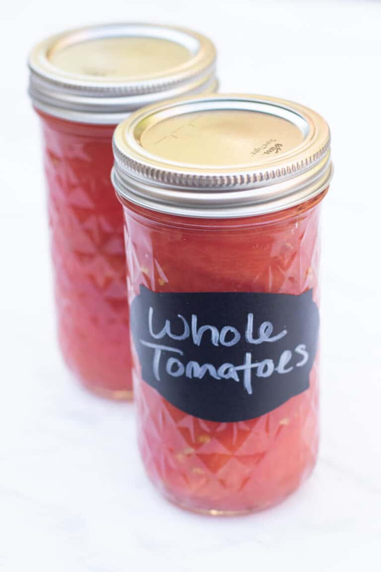 2 mason jars of whole tomatoes.