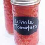 2 mason jars of whole tomatoes.