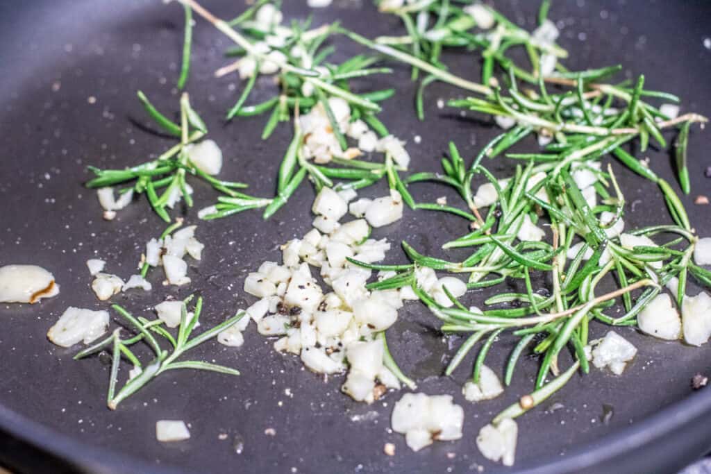 rosemary and garlic in a pan