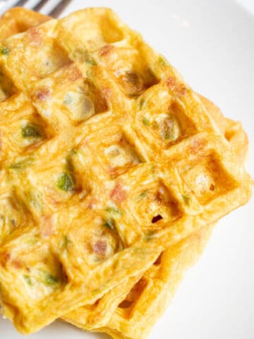 an overhead of stacked egg waffles.