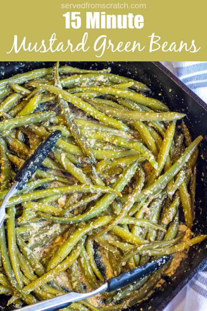a cast iron with mustard coated green beans with Pinterest pin text.