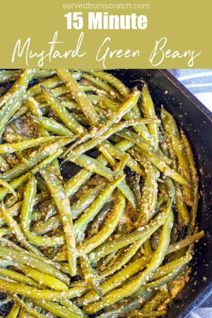 a cast iron with mustard coated green beans with Pinterest pin text.