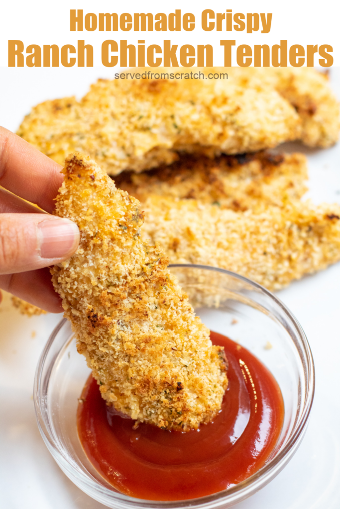a hand dipping a chicken tender in a ketchup with Pinterest pin text.