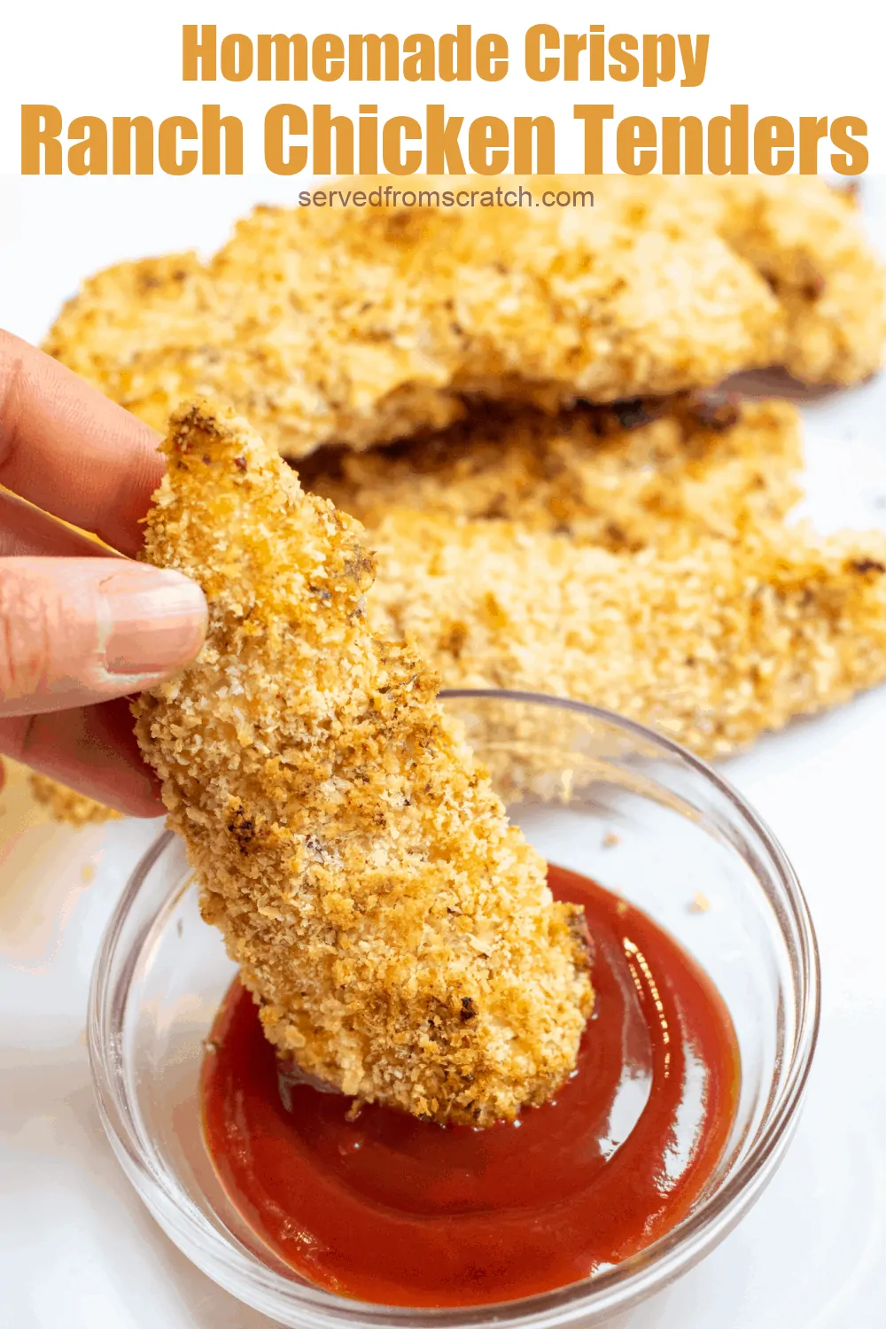 plate of baked chicken tenders and ketchup.