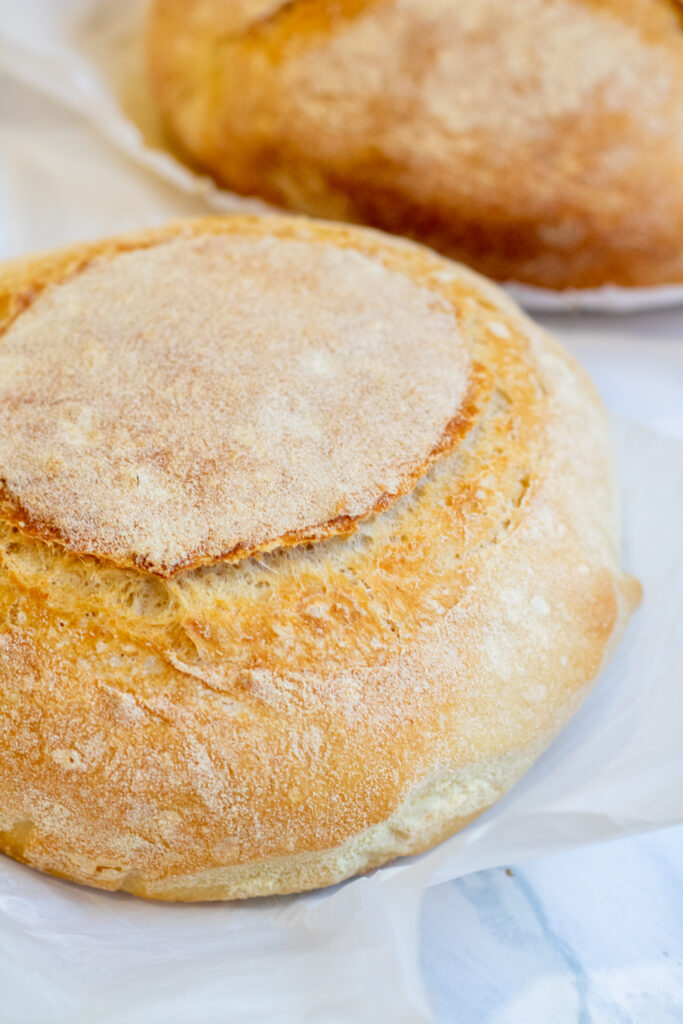 a round loaf of fresh baked bread 