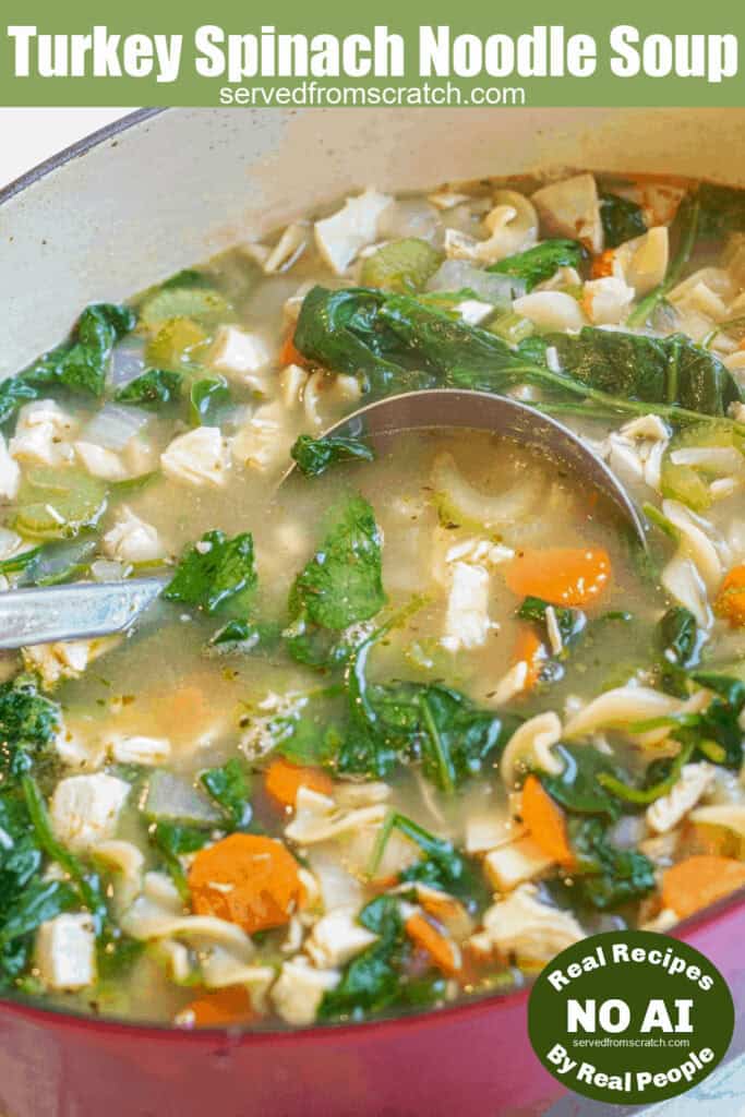 a pot of veggie noodle soup with spinach with ladle with Pinterest pin text with NO AI sticker.