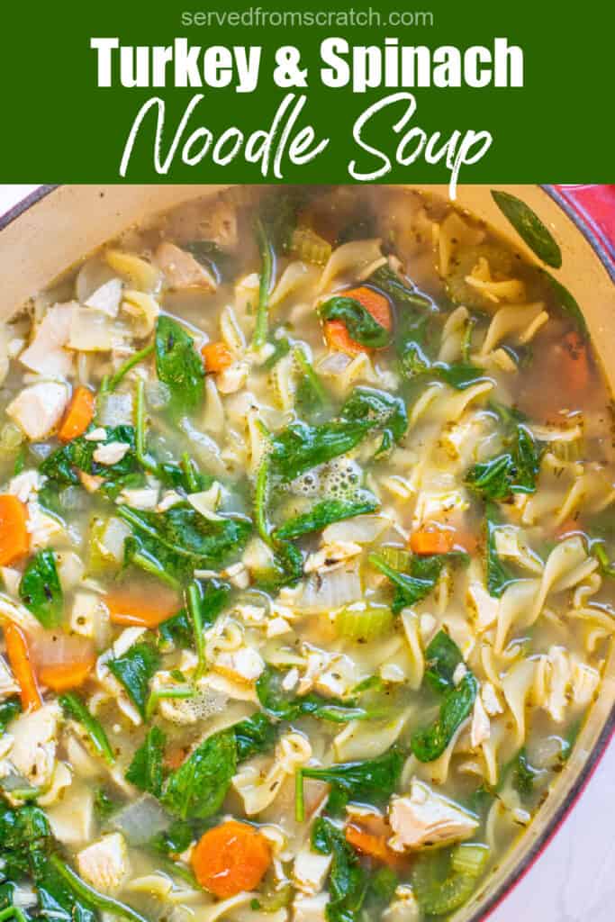 stock pot with soup with spinach and noodles with Pinterest pin text.