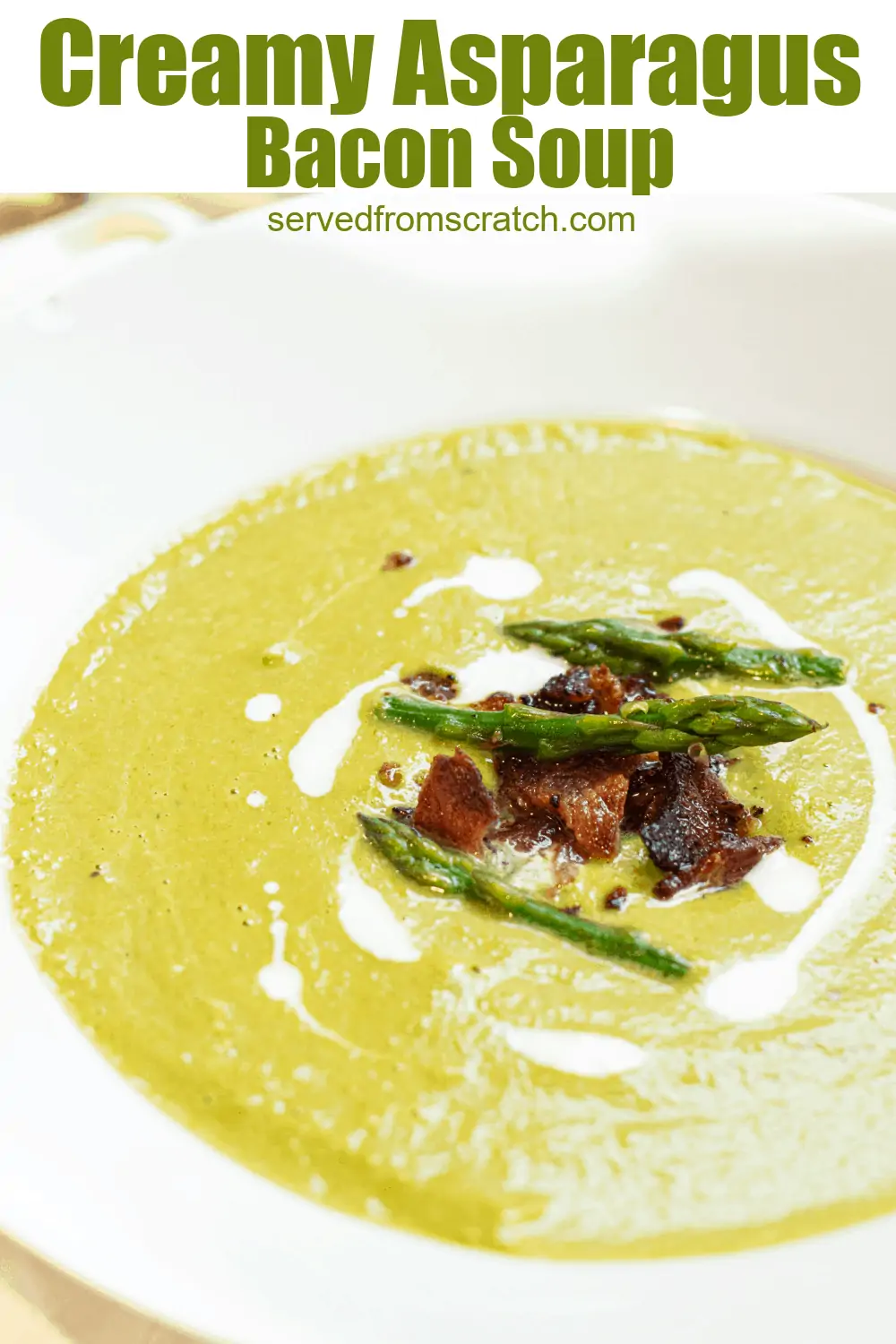 bowl of soup with bacon and asparagus and cream.