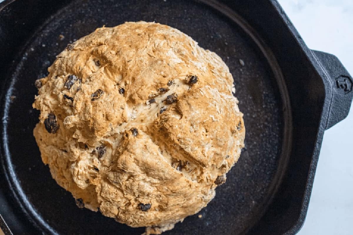 baked bred with raisins in a cast iron skillet.