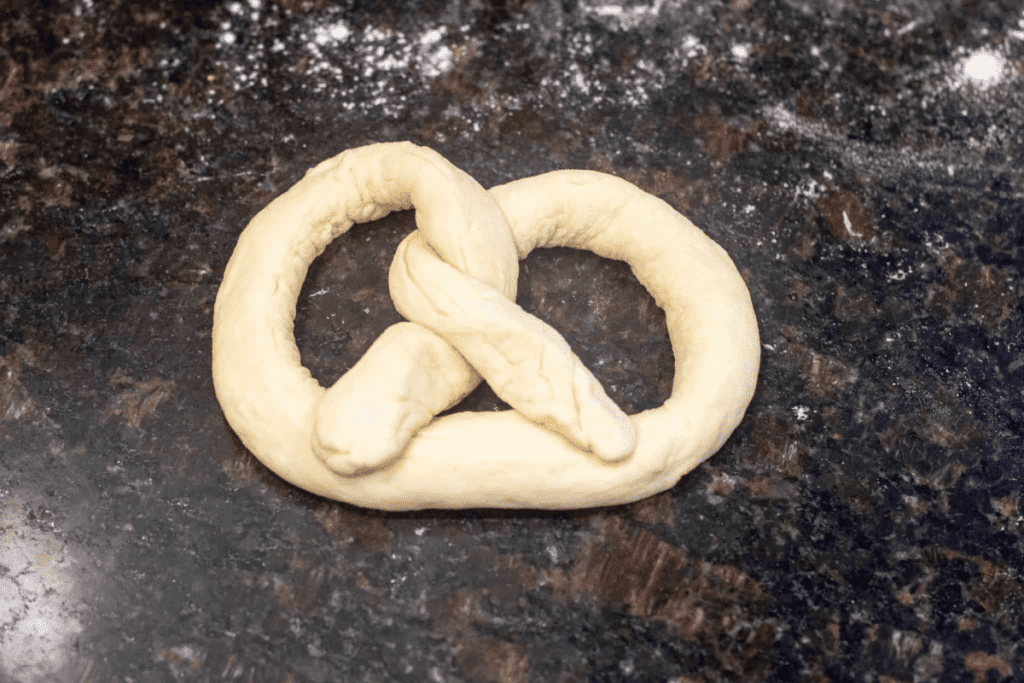 unbaked rolled large pretzel.