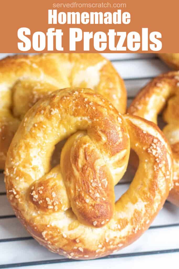 close up of a soft pretzel on a cooling rack with Pinterest pin text.