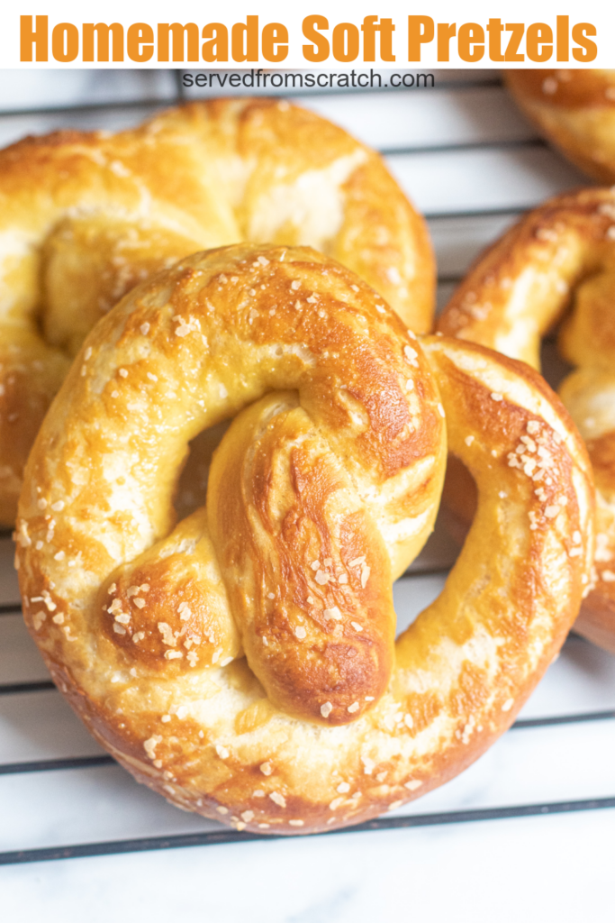 a close up of a big soft pretzel and pinterest text.