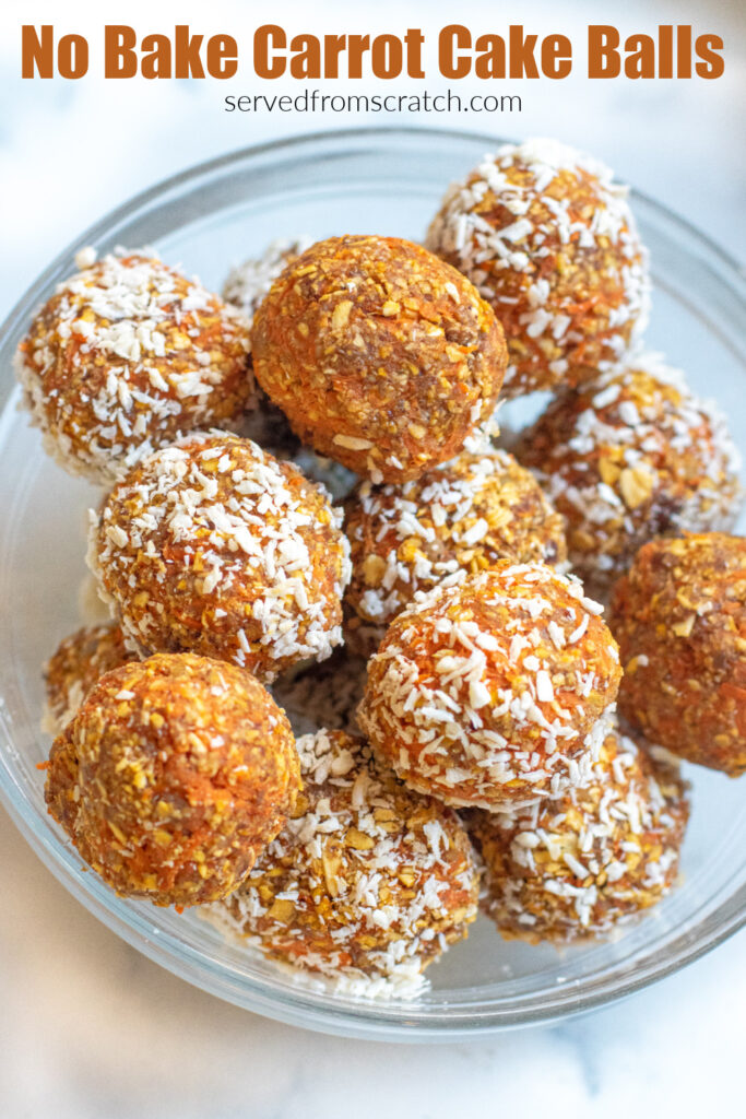 a bowl of balls of oats and carrots with some coated with coconut and some not with Pinterest pin text.