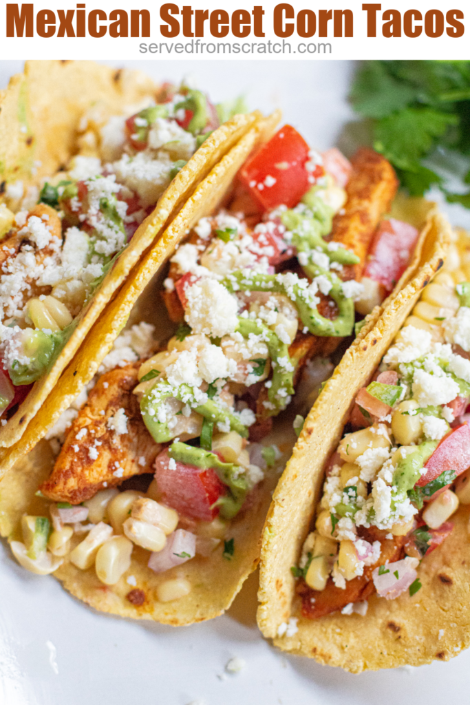 a plate of 3 corn tortilla tacos topped with crumbled cotija cheese and Pinterest pin text.