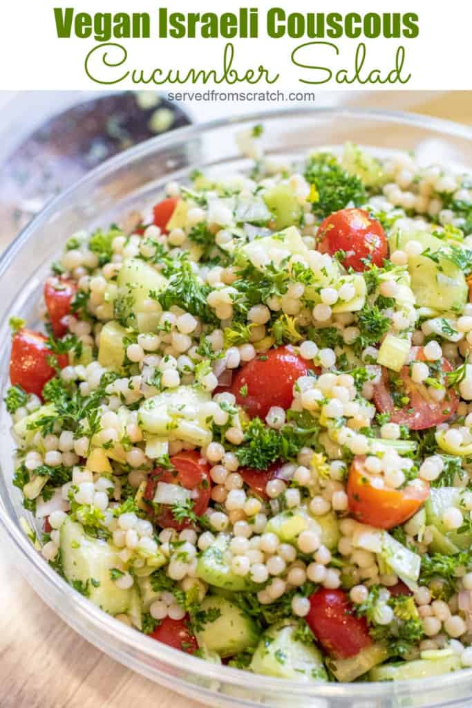 a bowl of couscous with tomatoes and cucumbers and parsley with Pinterest pin text.