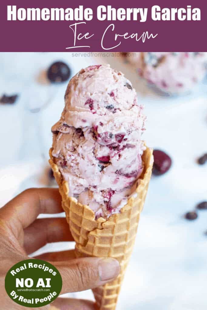 a hand holding an ice cream cone with cherry garcia ice cream and a NO AI sticker.