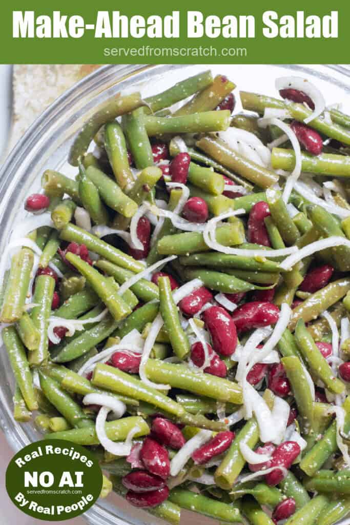 a large bowl of green bean and kidney bean salad with onions with Pinterest pin text with NO AI sticker.