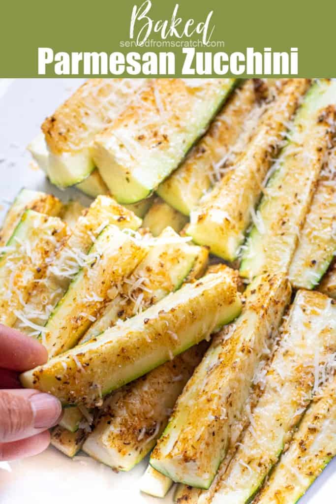 a hand grabbing a zucchini spear from a plate of baked zucchini spears with Pinterest pin text.