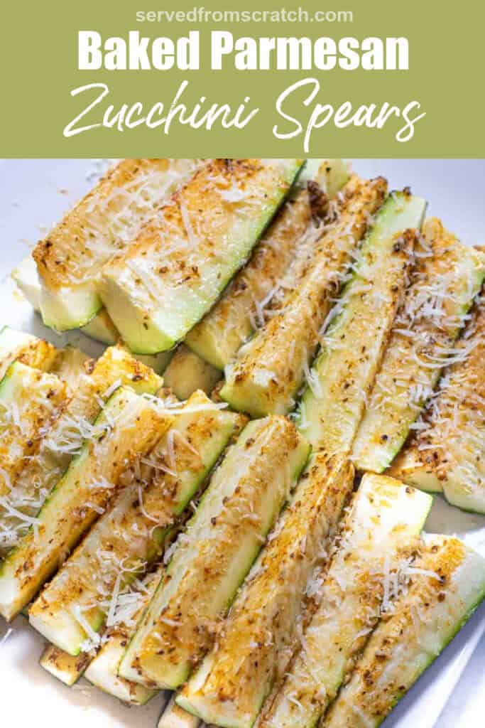 a plate of baked zucchini spears topped with parmesan cheese.
