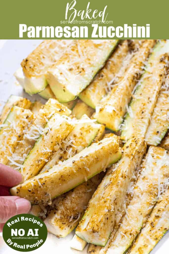 a plate of baked zucchini spears with parmesan cheese and Pinterest pin text and NO AI sticker.