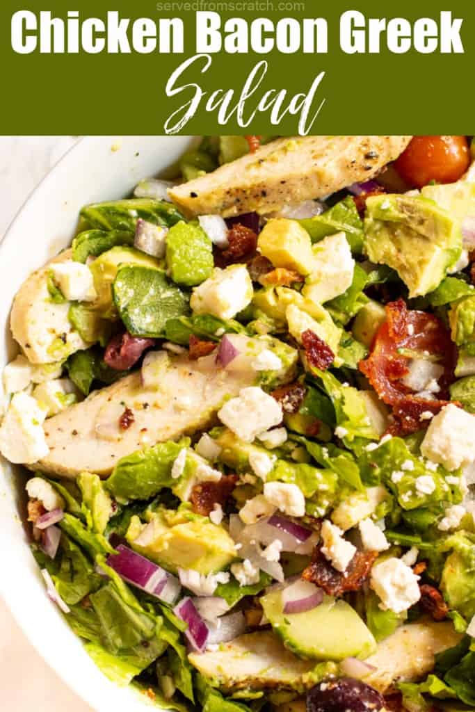 a Greek salad with chicken and Pinterest pin text.