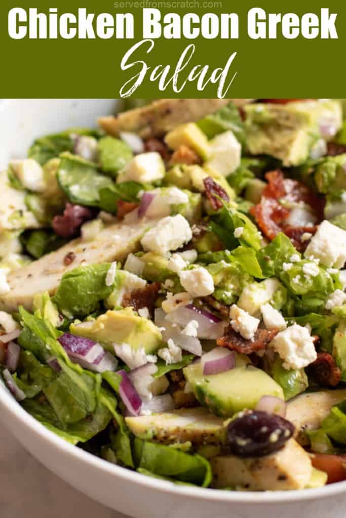 a Greek salad with chicken and Pinterest pin text.