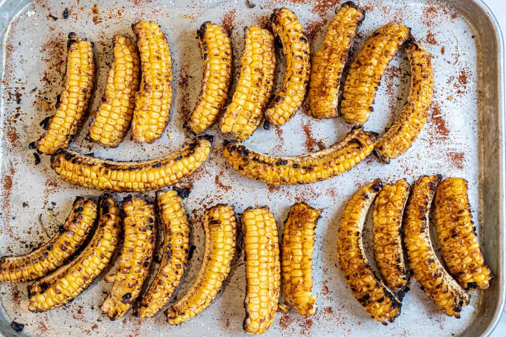 grilled corn ribs on a tray.