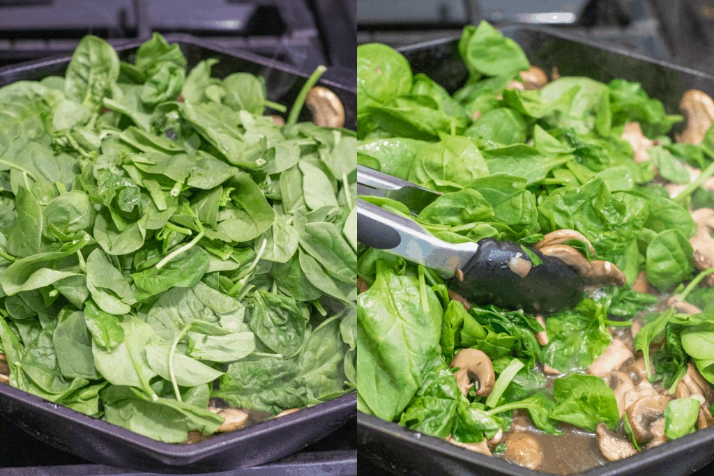 cast irons with fresh spinach and then with tongs mixing spinach in with mushrooms.