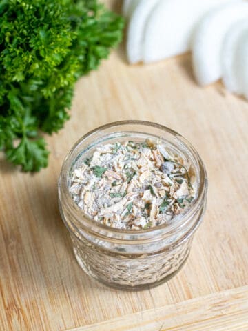 a small open mason jar with onion soup mix.